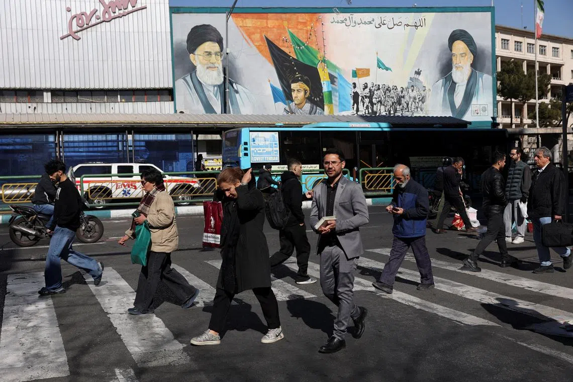People walk on a street in Tehran, Iran, January 31, 2026. Majid Asgaripour/WANA (West Asia News Agency) via REUTERS ATTENTION EDITORS - THIS PICTURE WAS PROVIDED BY A THIRD PARTY