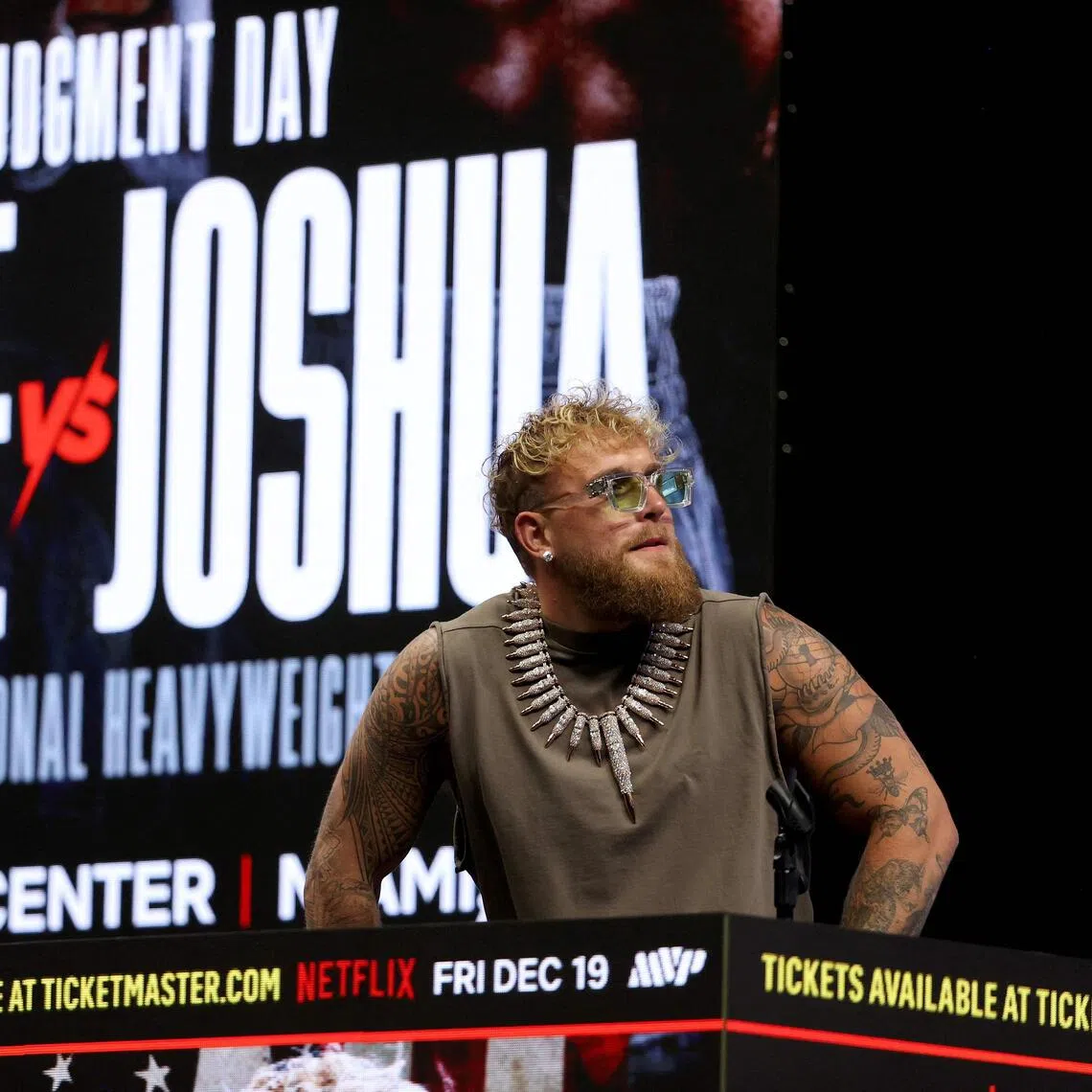 Jake Paul looks on during the press conference about his exhibition match against Anthony Joshua scheduled for December 19 at Kaseya Center.