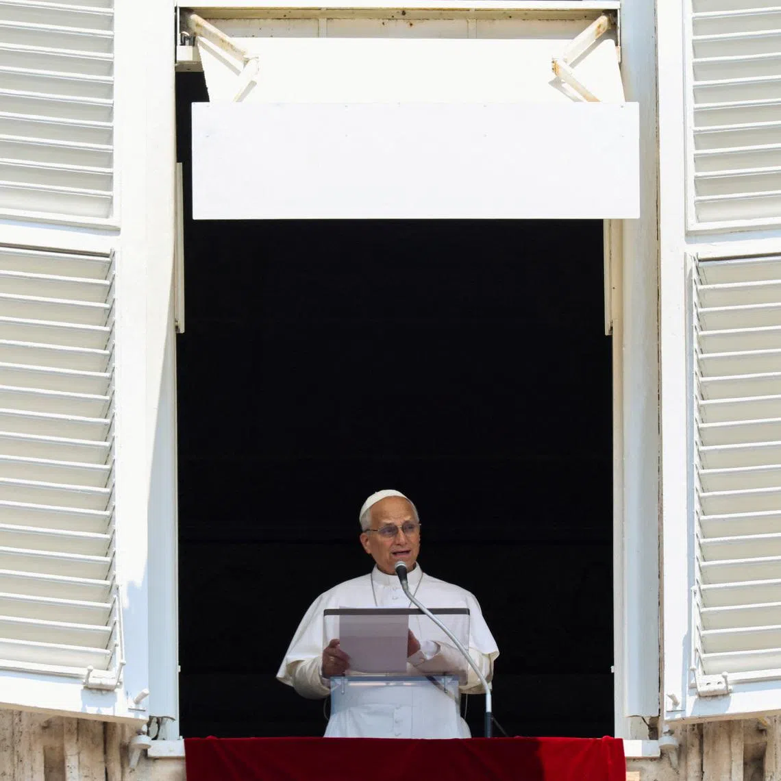 Pope Leo leads the Angelus prayer from a window of the Apostolic Palace at the Vatican, June 29, 2026. REUTERS/Yara Nardi