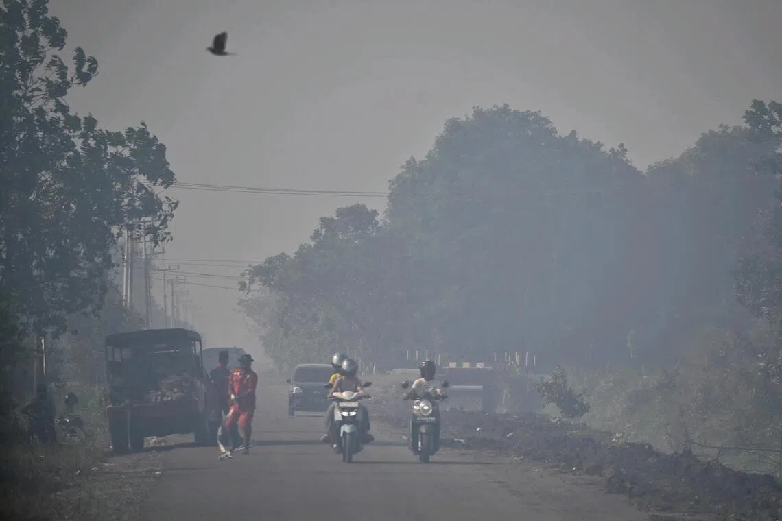 Visibility in Banjarbaru is low when the smoke thickens due to nearby fires.