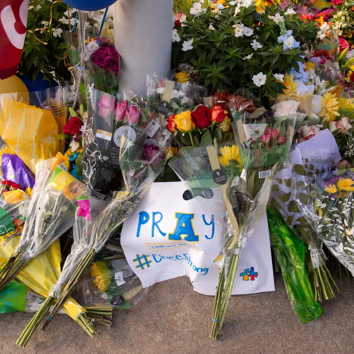 Flowers left at a makeshift memorial outside Apalachee High School after a mass shooting in Winder, Georgia, on Sept 5, 2024.
