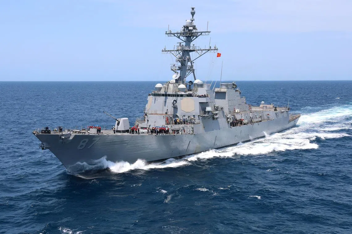 The U.S. Navy guided-missile destroyer USS Mason pulls alongside a fleet replenishment oiler in the Atlantic Ocean, July 17, 2021.  U.S. Navy/Bill Mesta/Handout via REUTERS/ File Photo