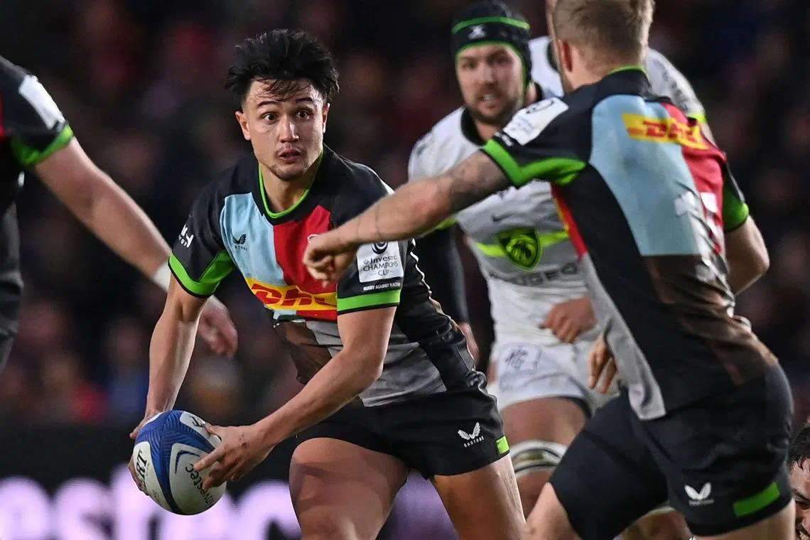 Harlequins' English fly-half Marcus Smith making a break in the European Rugby Champions Cup pool match against Frech side Toulouse in Twickenham on Dec 17, 2023.