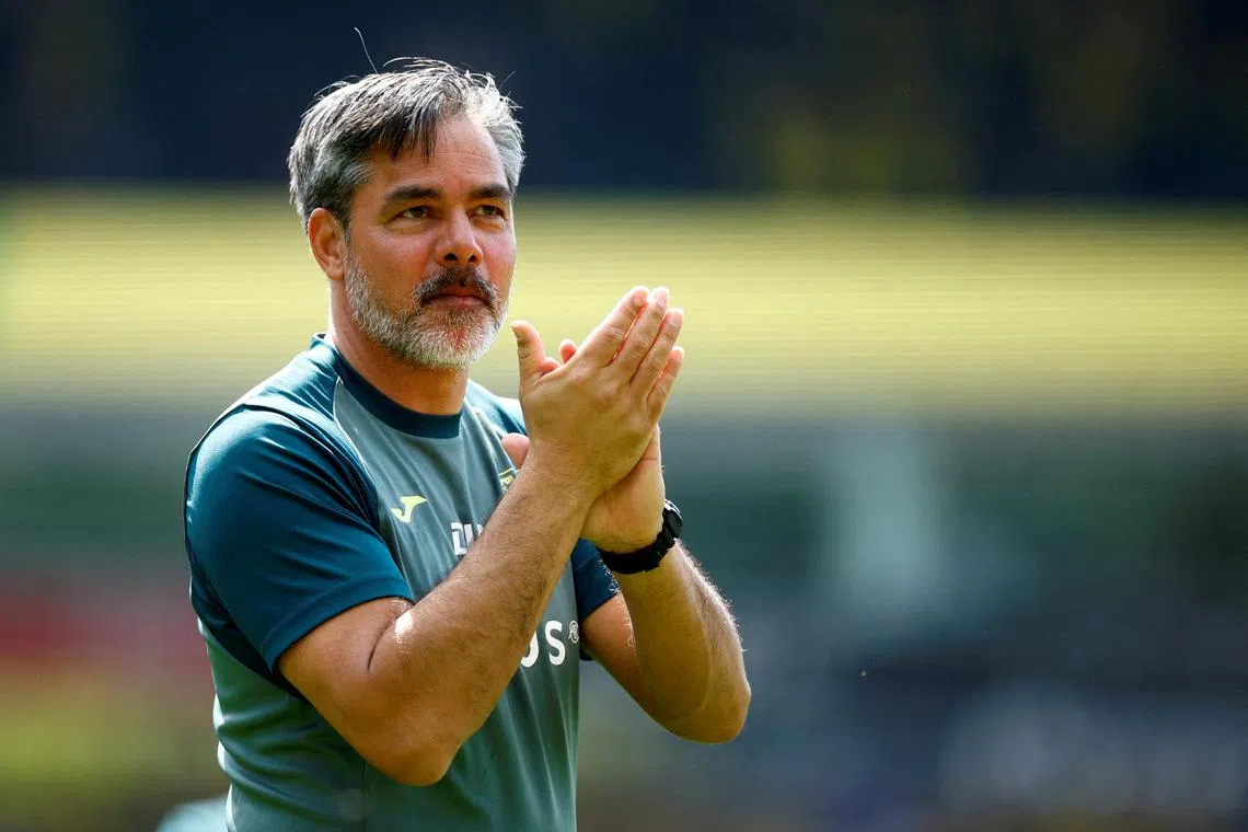 FILE PHOTO: Soccer Football - Championship - Play-Off - Semi Final - First Leg - Norwich City v Leeds United - Carrow Road, Norwich, Britain - May 12, 2024 Norwich City manager David Wagner applauds fans after the match Action Images/John Sibley /File Photo