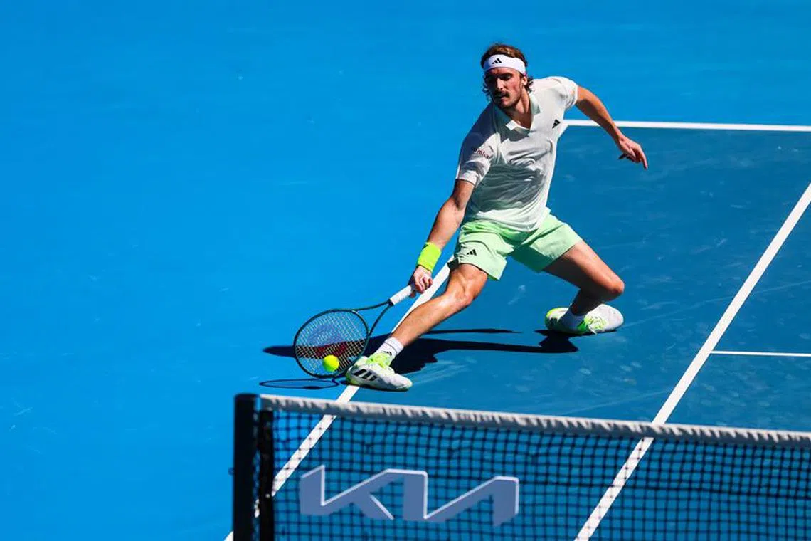 Jan 15, 2024; Melbourne, Victoria, Australia; Stefanos Tsitsipas of Greece plays a shot against Zizou Bergs (not pictured) of Belgium in Round 1 of the Men's Singles on Day 2 of the Australian Open tennis at Rod Laver Arena. Mandatory Credit: Mike Frey-USA TODAY Sports