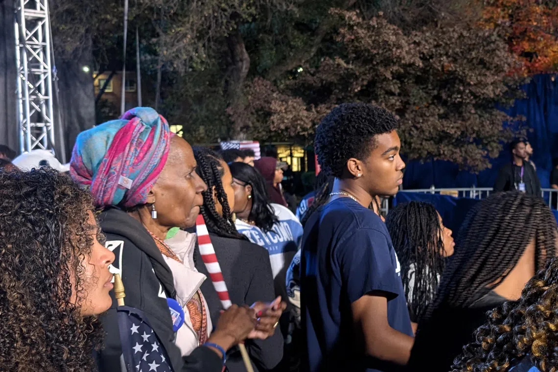 Retiree Sheila Carpar (centre) waited for six hours at Howard University in Washington for US Vice-President Kamala Harris to address the crowds.