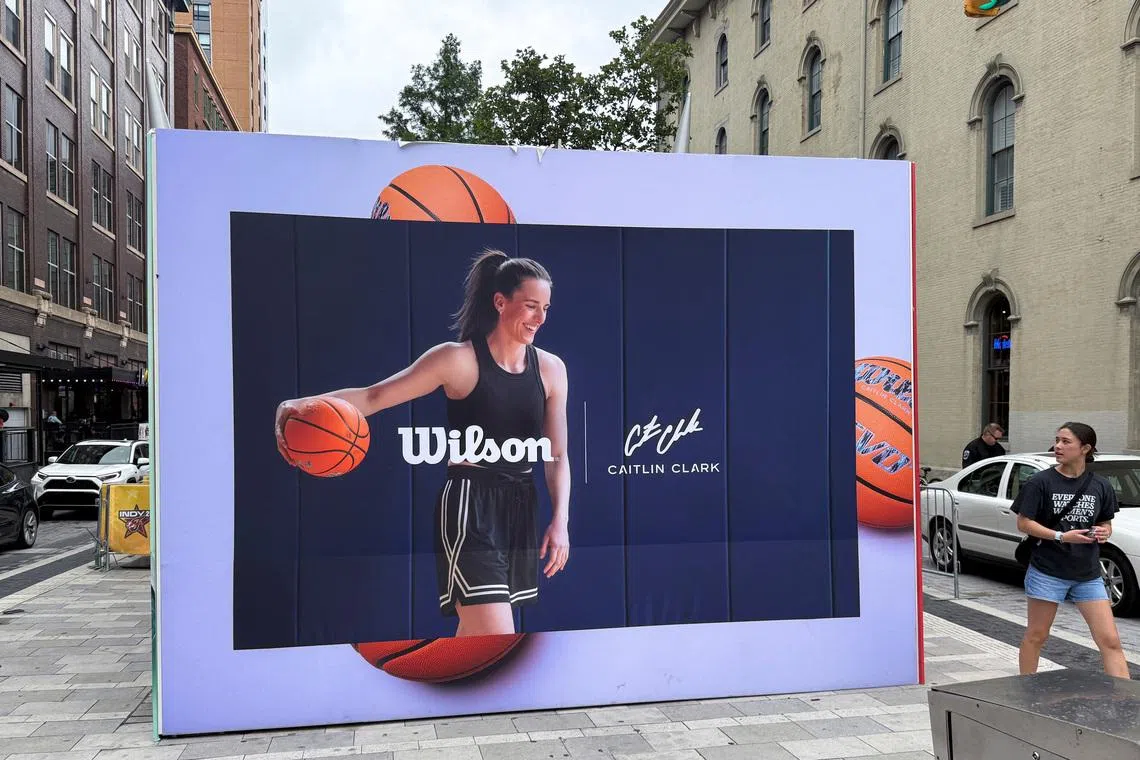 An advertisement featuring Caitlin Clark is displayed ahead of the WNBA All-Star Game, in Indianapolis, Indiana, July 19, 2025. REUTERS/Amy Tennery