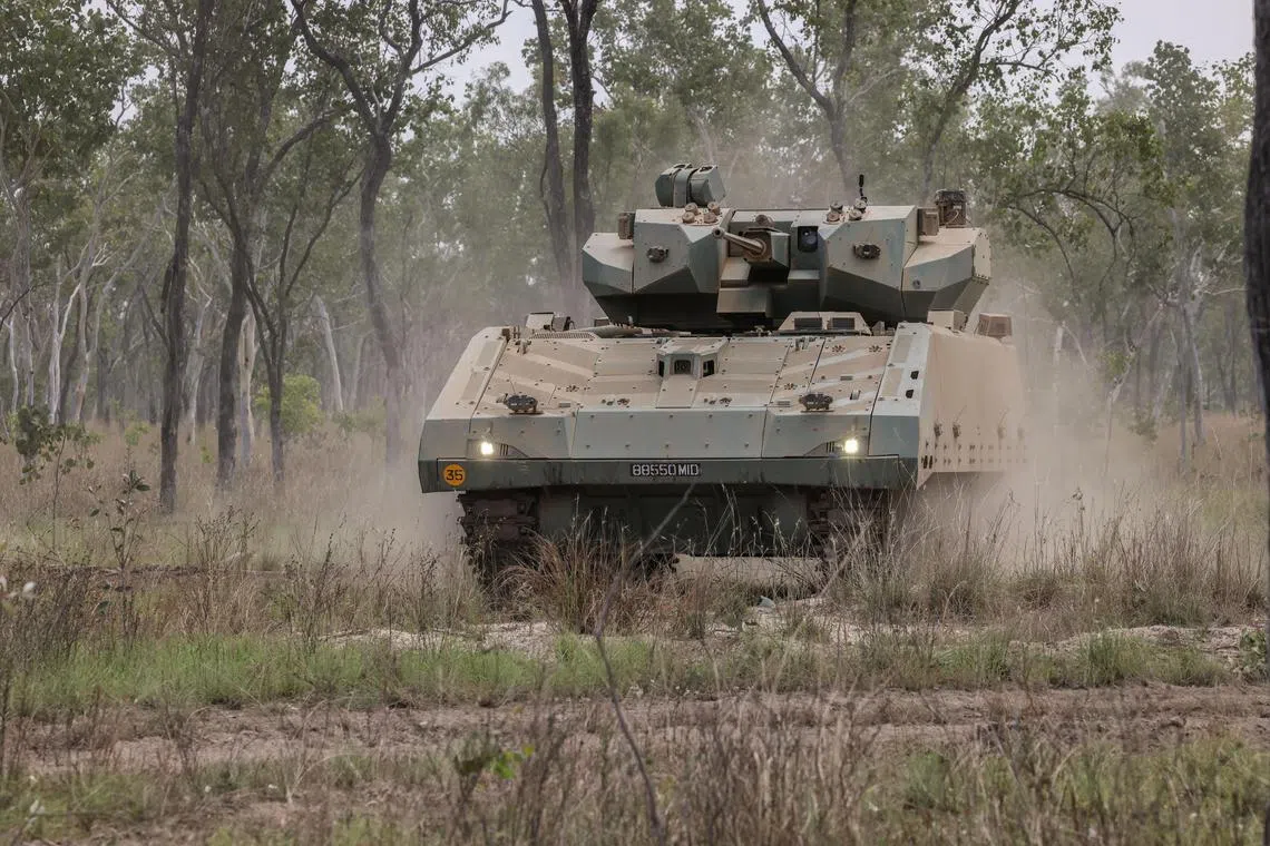 The Singapore Army's Hunter Armoured Fighting Vehicle, manoeuvring in the closed terrains at Shoalwater Bay Training Area during Exercise Wallaby.