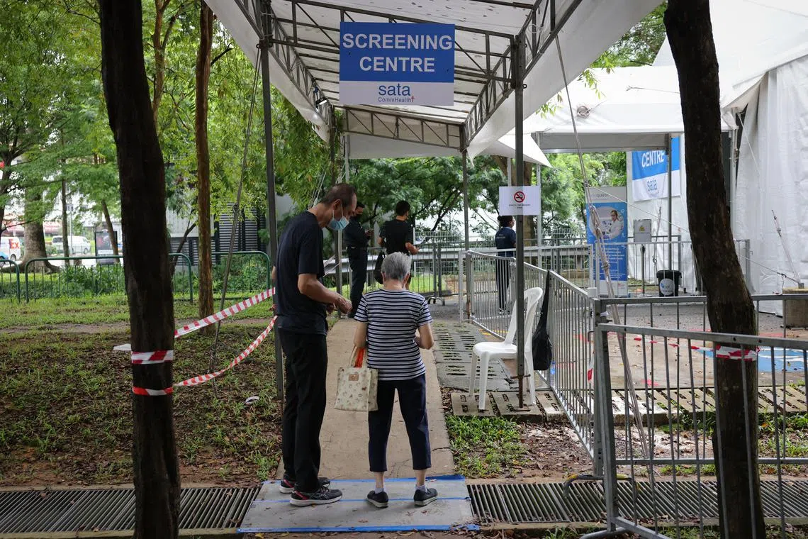 A tent has been set up at an open car park in the area for the screening for workers at the food centre and market.