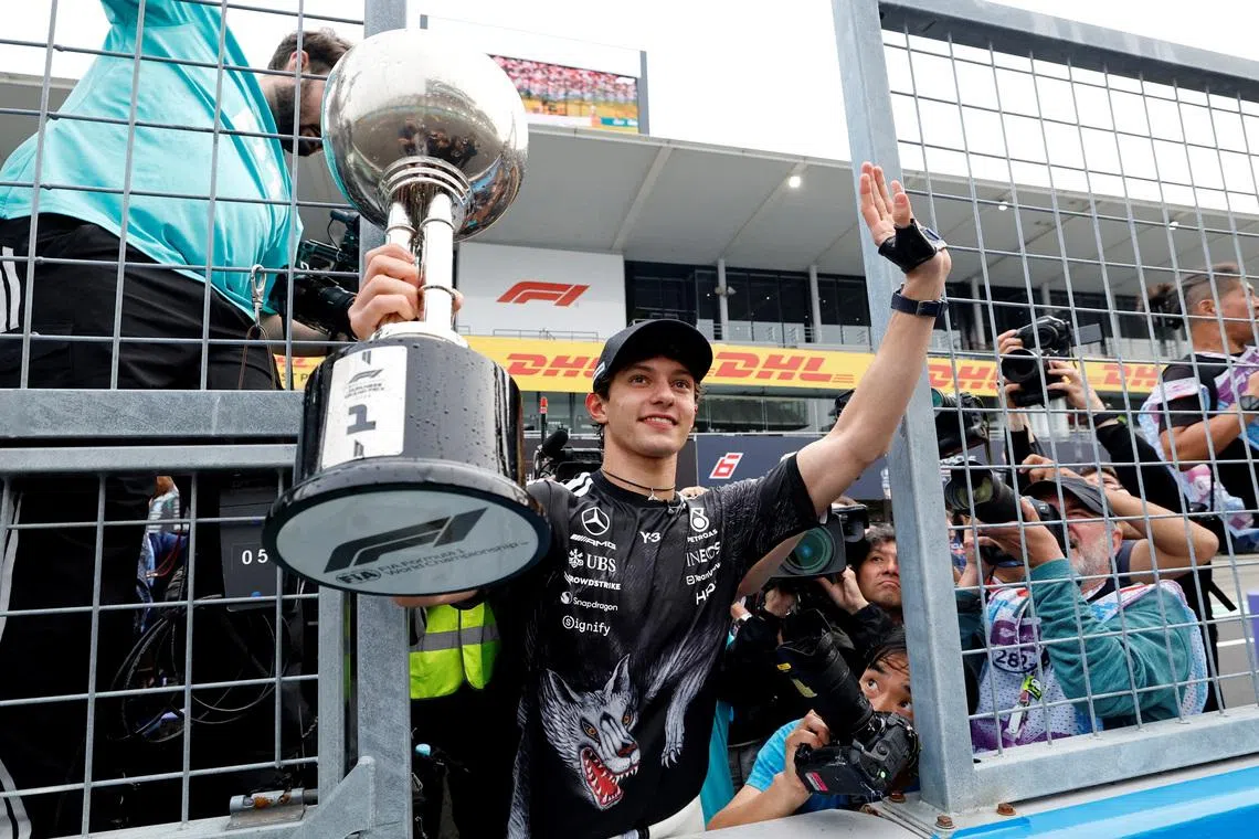 FILE PHOTO: Formula One F1 - Japanese Grand Prix - Suzuka Circuit, Suzuka, Japan - March 29, 2026 Mercedes' Andrea Kimi Antonelli celebrates with the trophy after winning the Japanese Grand Prix REUTERS/Kim Kyung-Hoon/File Photo