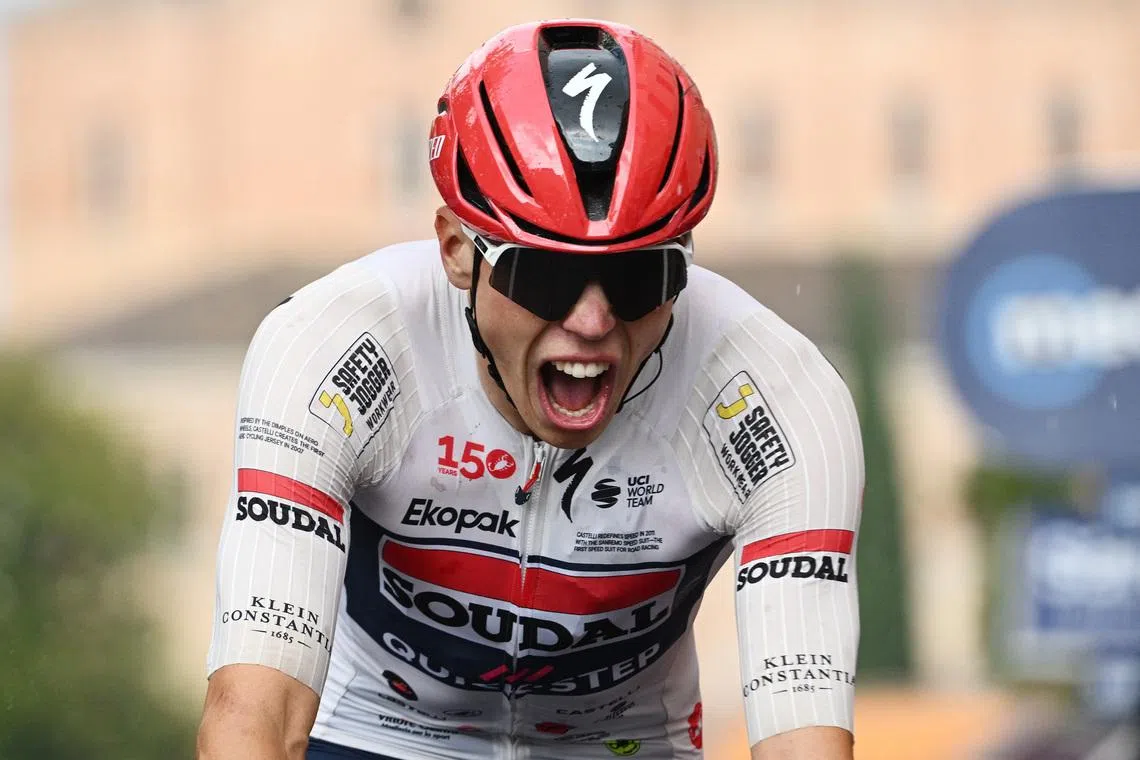 Cycling - Giro d'Italia - Stage 18 - Fai della Paganella to Pieve di Soligo - Italy - May 28, 2026 Soudal Quick Step's Paul Magnier celebrates winning stage 18 REUTERS/Jennifer Lorenzini