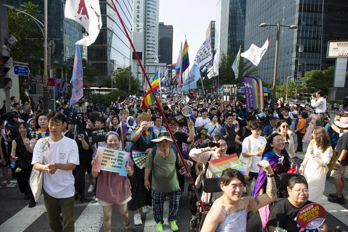 Participants take part in the celebrations during the 24th Seoul Queer Parade in Seoul.