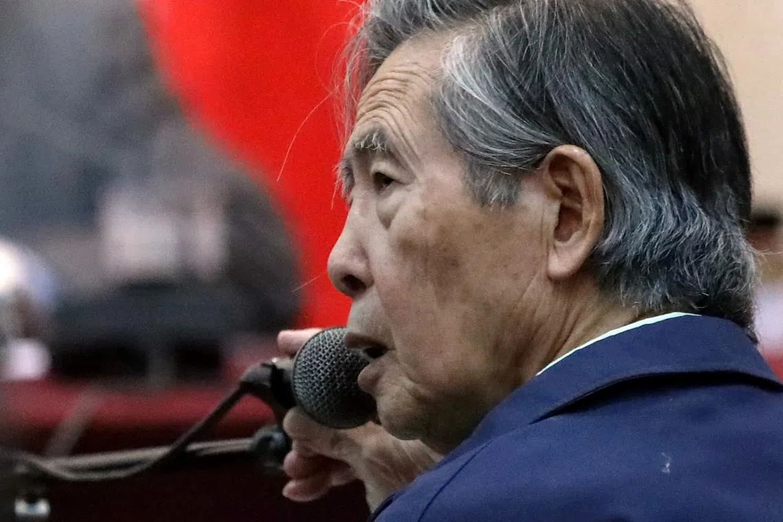 FILE PHOTO: Former President of Peru Alberto Fujimori attends a trial as a witness at the navy base in Callao, Peru March 15, 2018. Picture taken through a window. REUTERS/Mariana Bazo/File Photo