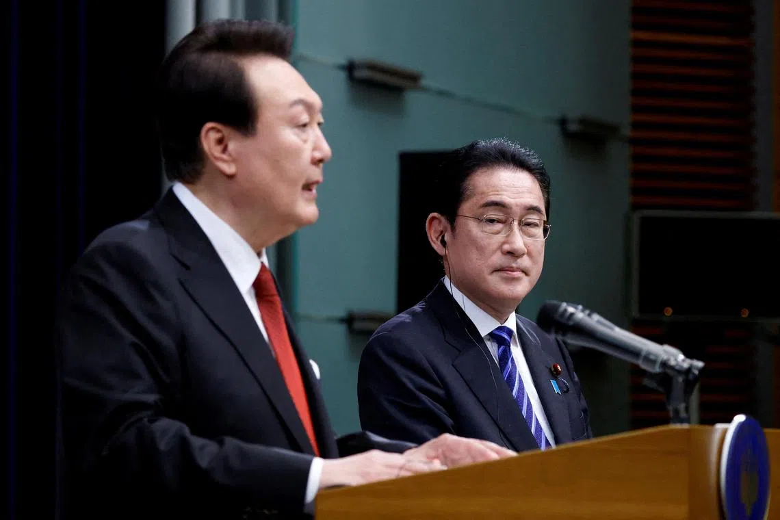 FILE PHOTO: South Korea's President Yoon Suk Yeol and Japan's Prime Minister Fumio Kishida hold a joint news conference at the prime minister's official residence in Tokyo, Japan March 16, 2023. Kiyoshi Ota/Pool via REUTERS/File Photo