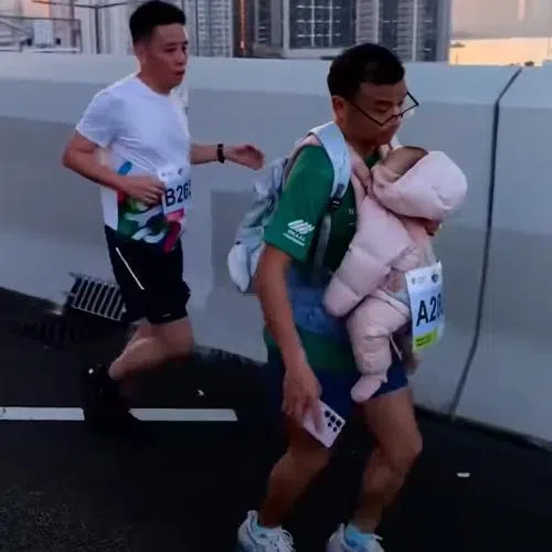 Critics skewered the man for risking his child’s safety – and the organisers for somehow missing the baby until more than a third into the race.