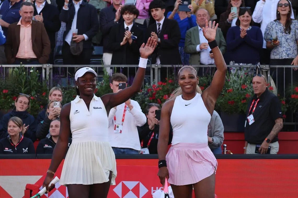 US tennis player Serena Williams (right) celebrating with Victoria Mboko of Canada after winning their doubles match against Nicole Melichar-Martinez of the US and Erin Routliffe of New Zealand at the HSBC Tennis Championships at Queens Club in London, Britain, on June 9.