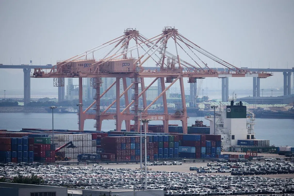 FILE PHOTO: KIA Motors' vehicles are parked to be exported, at a port in Pyeongtaek, South Korea, July 31, 2025.   REUTERS/Kim Hong-Ji/File Photo