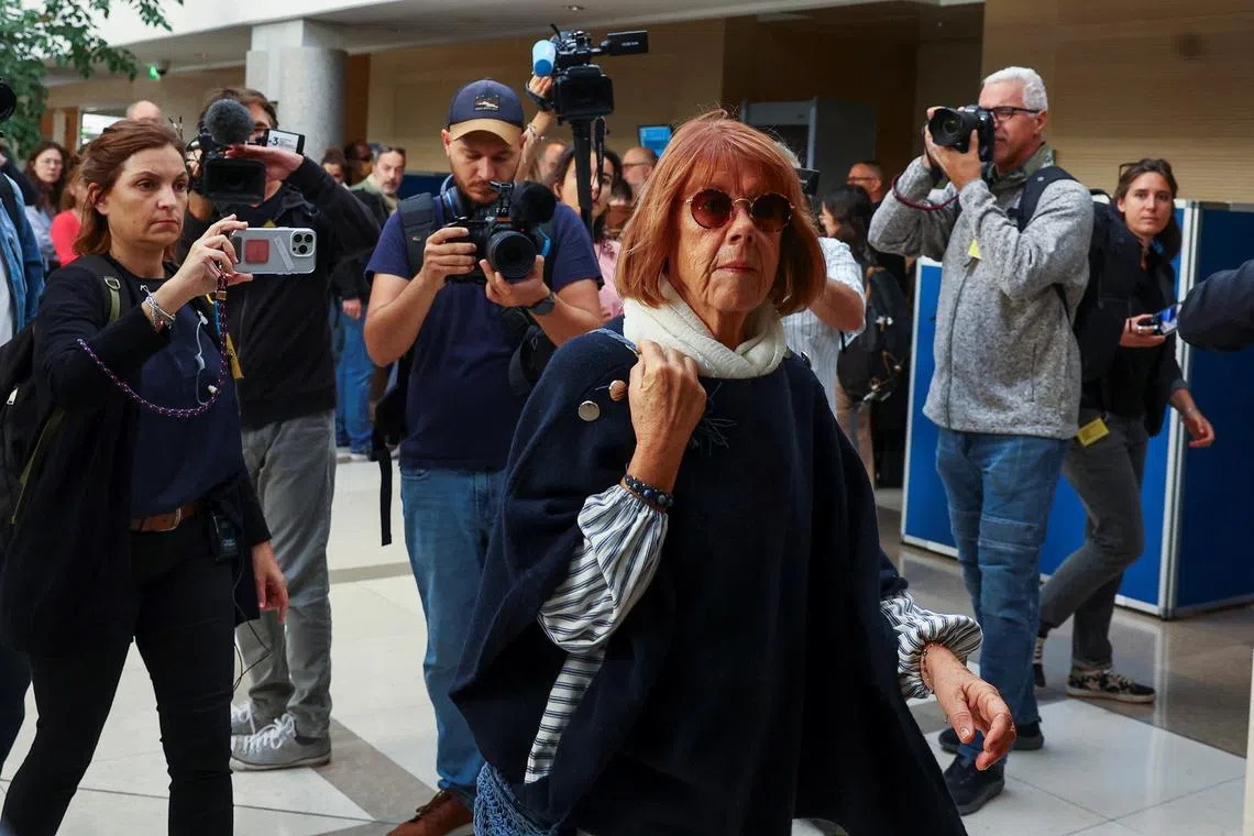 Gisele Pelicot who has allegedly been drugged and raped by men solicited by her husband Dominique Pelicot, walks at the courthouse in Avignon, France, September 10, 2024. REUTERS/Manon Cruz