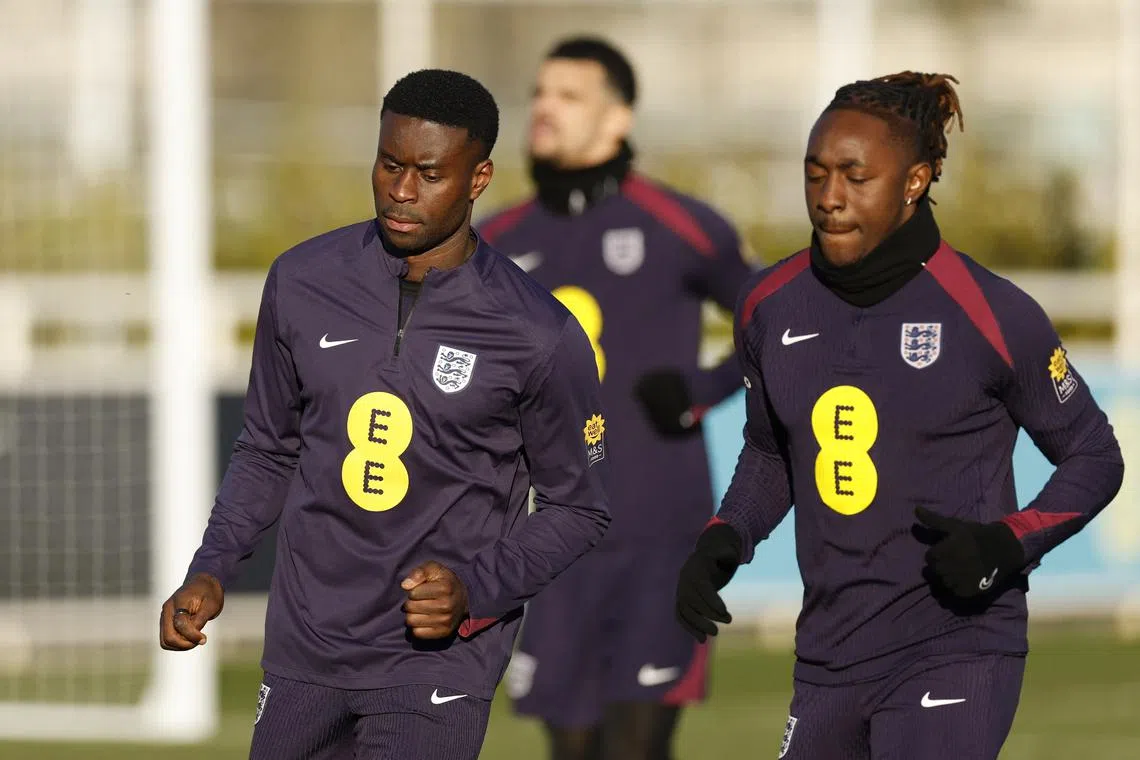 Soccer Football - World Cup - UEFA Qualifiers - England Training - St George's Park, Burton upon Trent, Britain - March 18, 2025 England's Marc Guehi and Eberechi Eze during training Action Images via Reuters/Jason Cairnduff/File Photo
