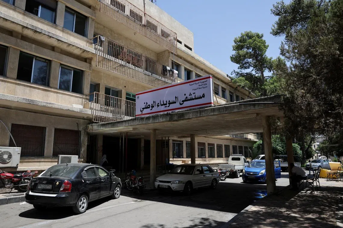 FILE PHOTO: A view shows Sweida National Hospital, following deadly clashes between Druze fighters, Sunni Bedouin tribes and government forces, in Syria's predominantly Druze city of Sweida, Syria July 25, 2025. REUTERS/Khalil Ashawi/File photo
