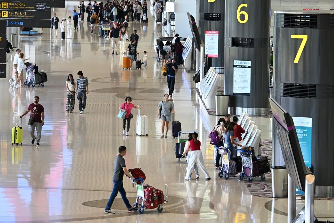 Generic photo of passengers at the departure hall of Changi Airport Terminal 4 on July 16, 2025. Can be used for aviation, air travel, tourists etc stories