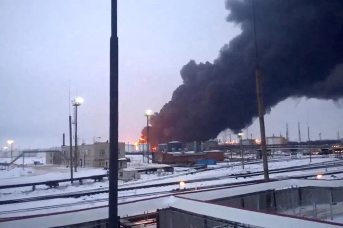 Smoke billows after Ukraine's SBU drone strikes a refinery, amid Russia's attack on Ukraine, in Ryazan, Ryazan Region, Russia, in this screen grab from a video obtained by Reuters, March 13, 2024. Video Obtained By Reuters/via REUTERS