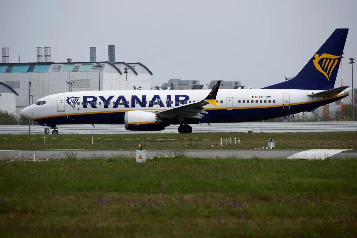 A Ryanair Boeing 737 MAX 8-200 Aircraft prepares to take off from the Nantes Atlantique Airport in Bouguenais near Nantes, France, April 3, 2024. REUTERS/Stephane Mahe/File Photo