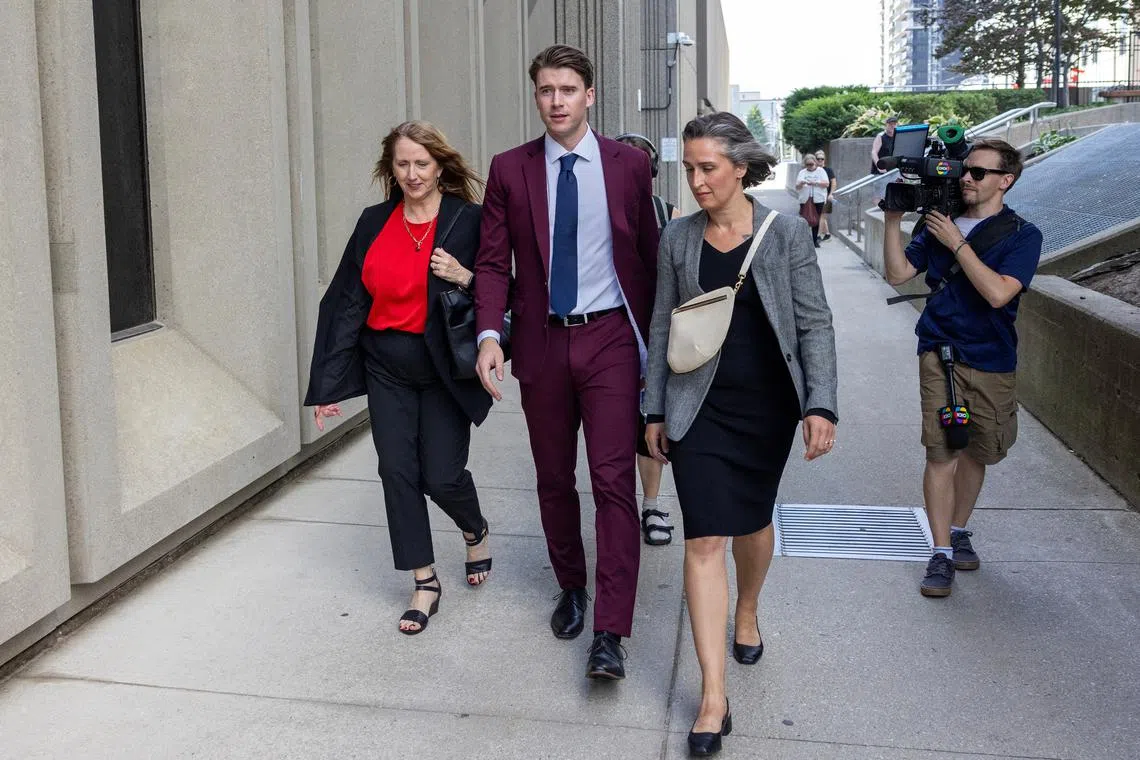 Carter Hart leaves court after a judge found him and his teammates not guilty in the trial involving players from Canada’s 2018 gold medal–winning world junior hockey team, who were charged with sexually assaulting a woman in a hotel room, at the Superior Court of Justice in London, Ontario, Canada, July 24, 2025. REUTERS/Carlos Osorio