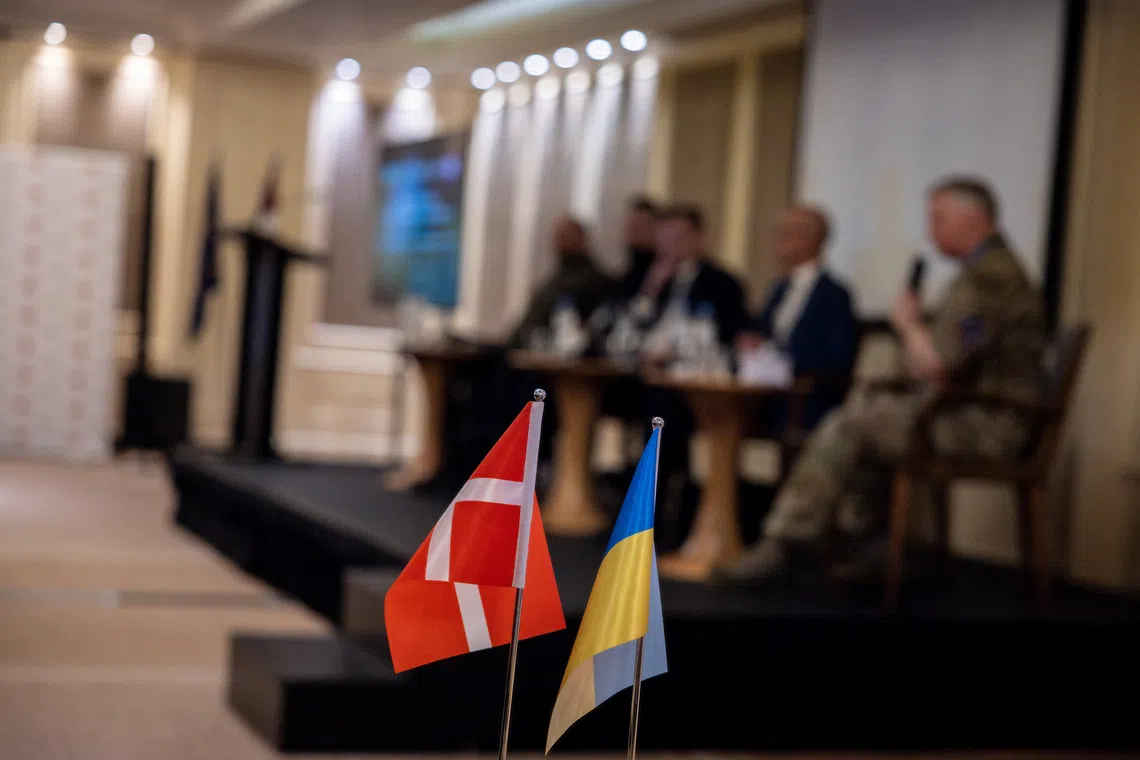 The Danish and Ukrainian flags are on display at a Denmark-Ukraine Defence Industry Conference, amid Russia’s attack on Ukraine, in Kyiv, Ukraine, March 23, 2024. REUTERS/Thomas Peter/File Photo