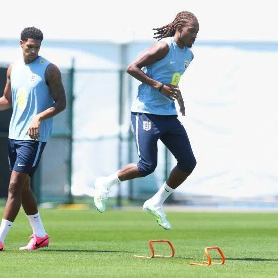 Djed Spence during training on June 20, 2026, with Jarel Quansah looking on in Kansas City. 
