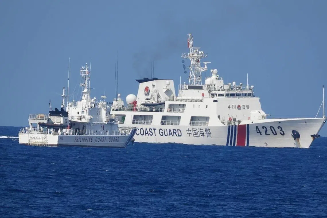 A Chinese Coast Guard vessel blocking the Philippine Coast Guard's BRP Malabrigo in the South China Sea on June 30.