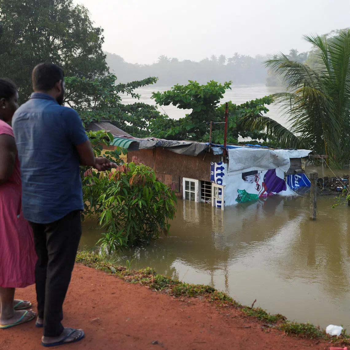 A house partially submerged in flood water, following Cyclone Ditwah in Peliyagoda, Sri Lanka, on Dec 1.