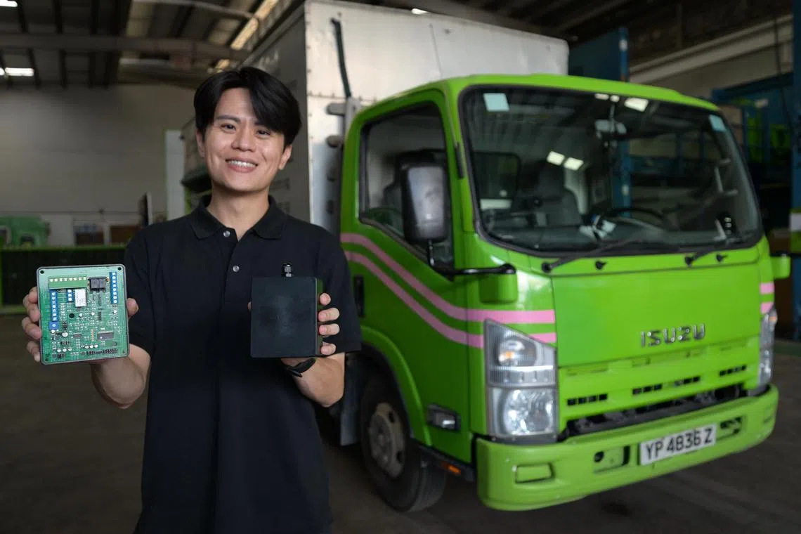 Moses Lim, 37, director of NLT Vehicle Service Pte Ltd with a set of speed limiter.