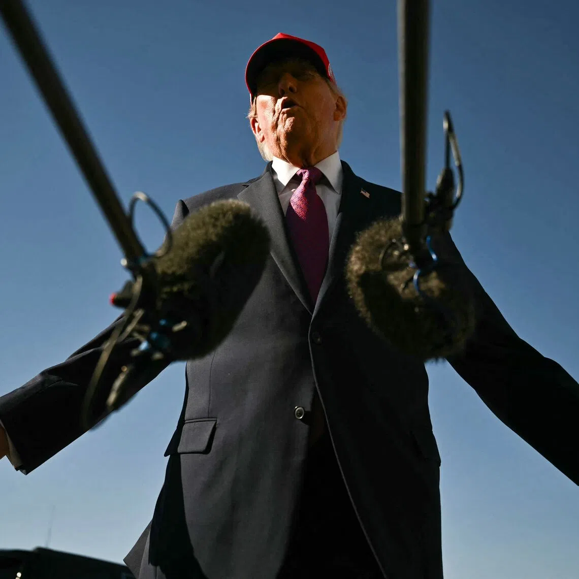 US President Donald Trump speaks to the press after addressing a campaign rally at Laughlin/Bullhead International Airport in Arizona on Oct 14.