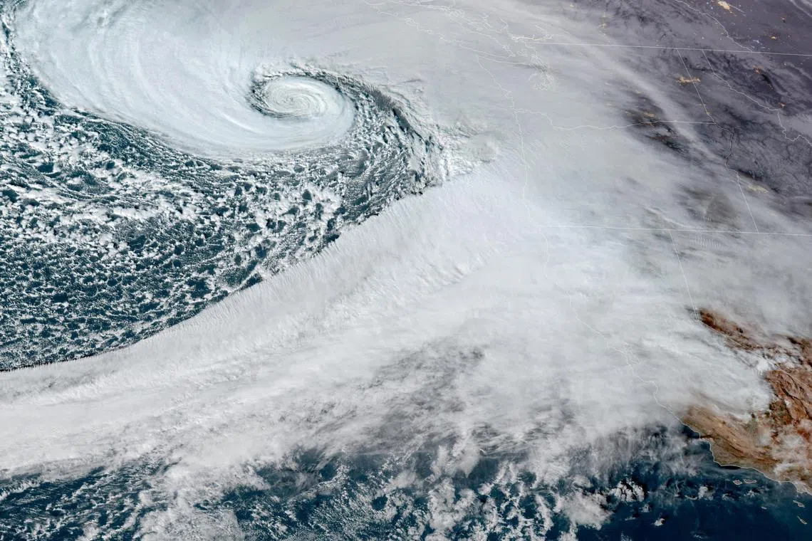 A low pressure storm system known as a \"bomb cyclone\" forms off the coast of the U.S. Pacific Northwest and western Canada in a composite satellite image November 19, 2024.  CIRA/NOAA/Handout via REUTERS/File Photo
