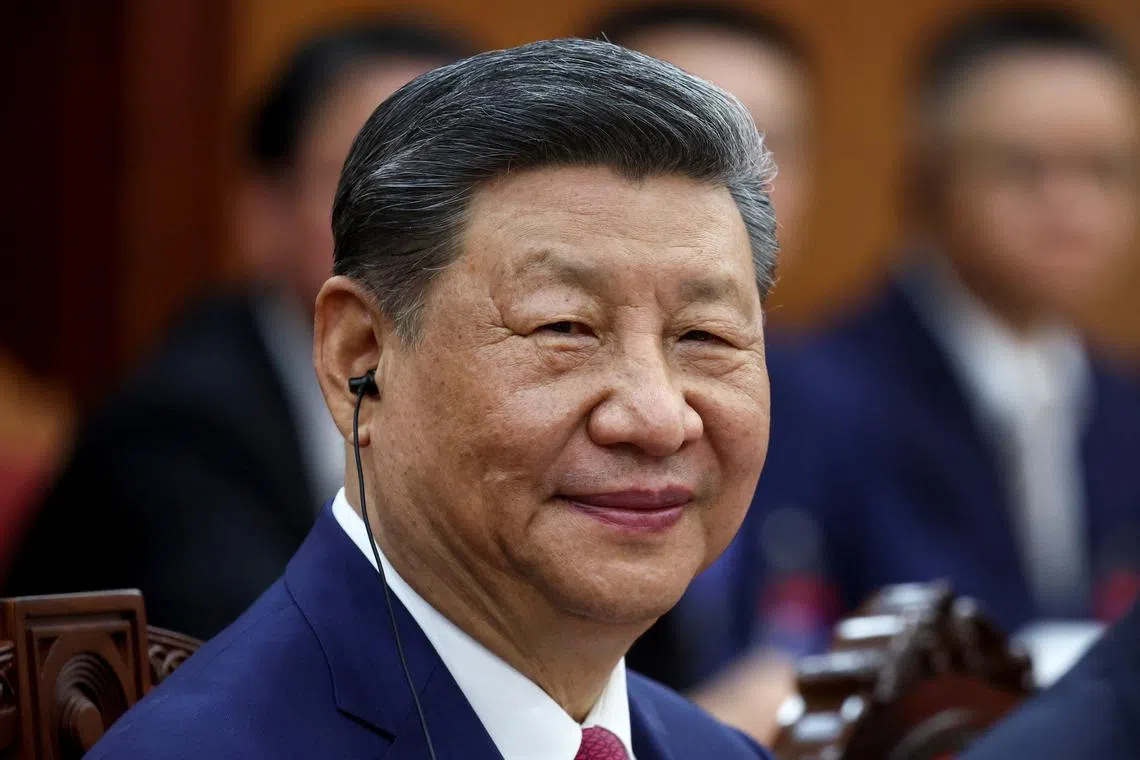 FILE PHOTO: Chinese President Xi Jinping looks on, during his two-day state visit, in Hanoi, Vietnam, April 14, 2025. REUTERS/Athit Perawongmetha/Pool/File Photo