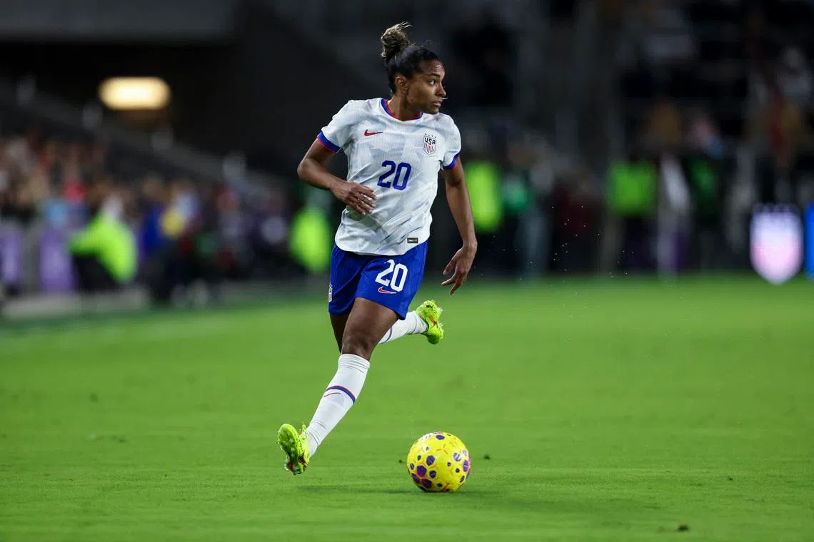 Nov 28, 2025; Orlando, Florida, USA; USA forward Catarina Macario (20) dribbles the ball against Italy during the first half at Inter&Co Stadium. Mandatory Credit: Morgan Tencza-Imagn Images