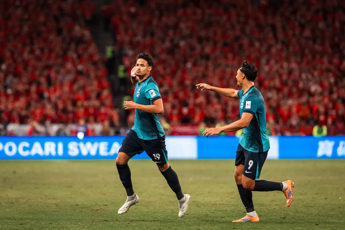 Ilhan Fandi (left) during the comeback 2-1 win over Hong Kong at the Kai Tak Stadium on Nov 18.