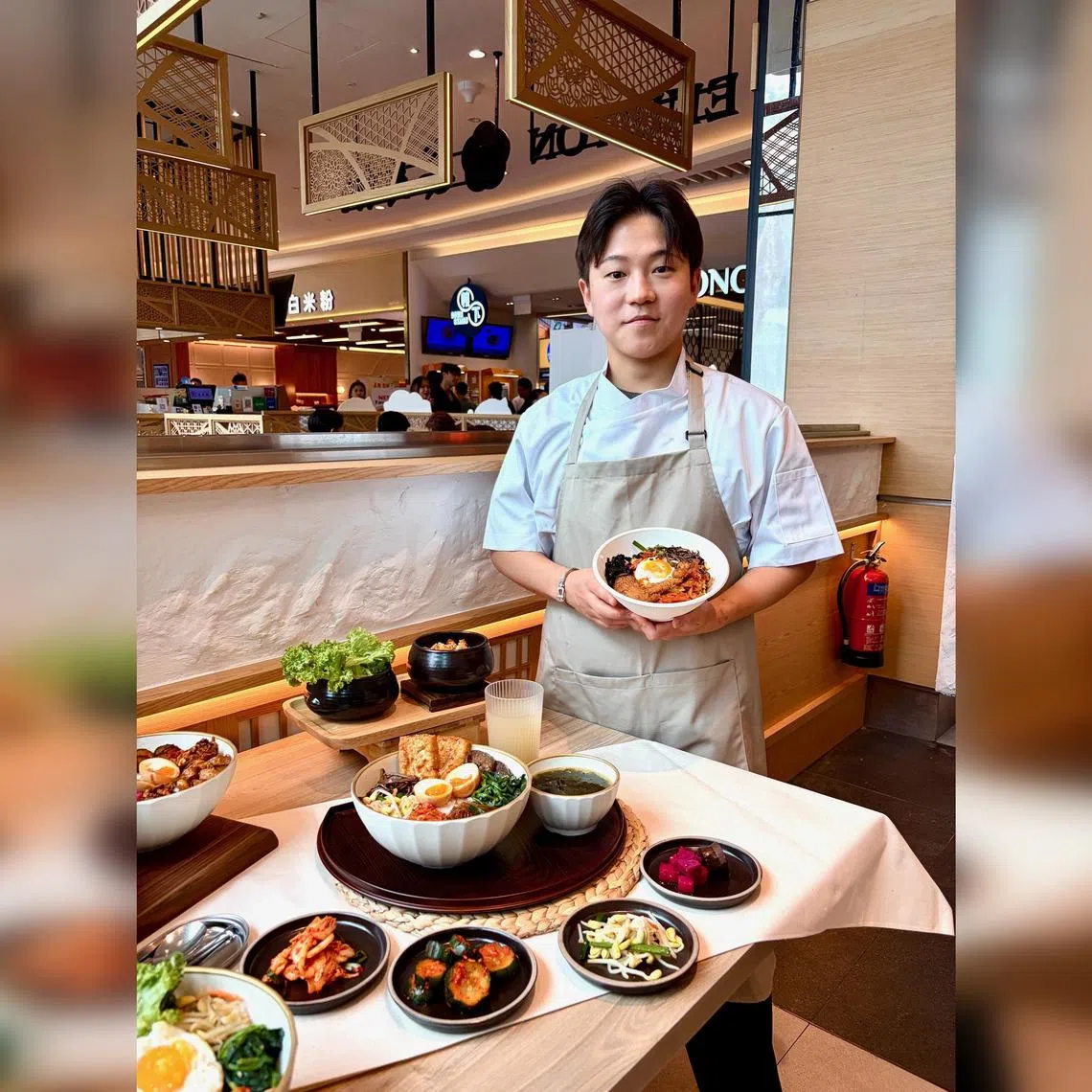 Bibim Deli's South Korean chef-owner Min Yohan at the casual eatery at Suntec City. 