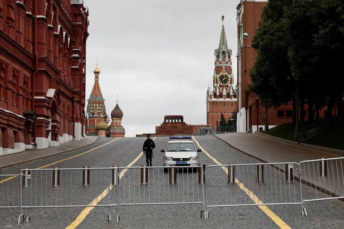 A police officer guarding a closed Red Square in Moscow on June 24.