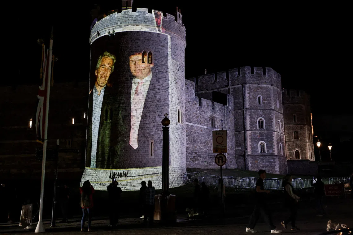 An image of U.S. President Donald Trump alongside disgraced financier Jeffrey Epstein is projected on Windsor castle, after U.S. President Donald Trump and first lady Melania Trump arrival for a state visit to the country, in Windsor, Berkshire, Britain September 16, 2025. REUTERS/Phil Noble