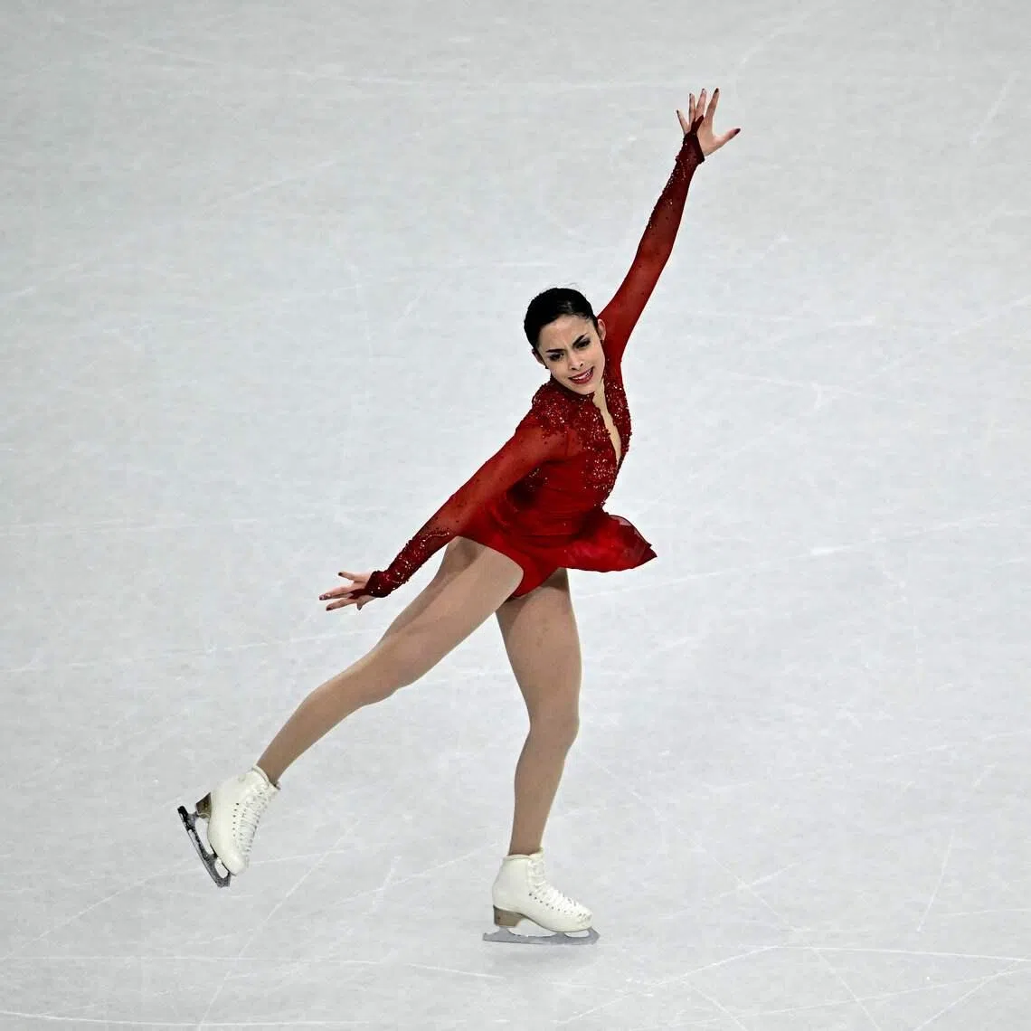 Canada's Madeline Schizas competes in the figure skating women's singles free skating team event during the Milano Cortina 2026 Winter Olympic Games at Milano Ice Skating Arena in Milan on February 8, 2026. (Photo by JULIEN DE ROSA / AFP)