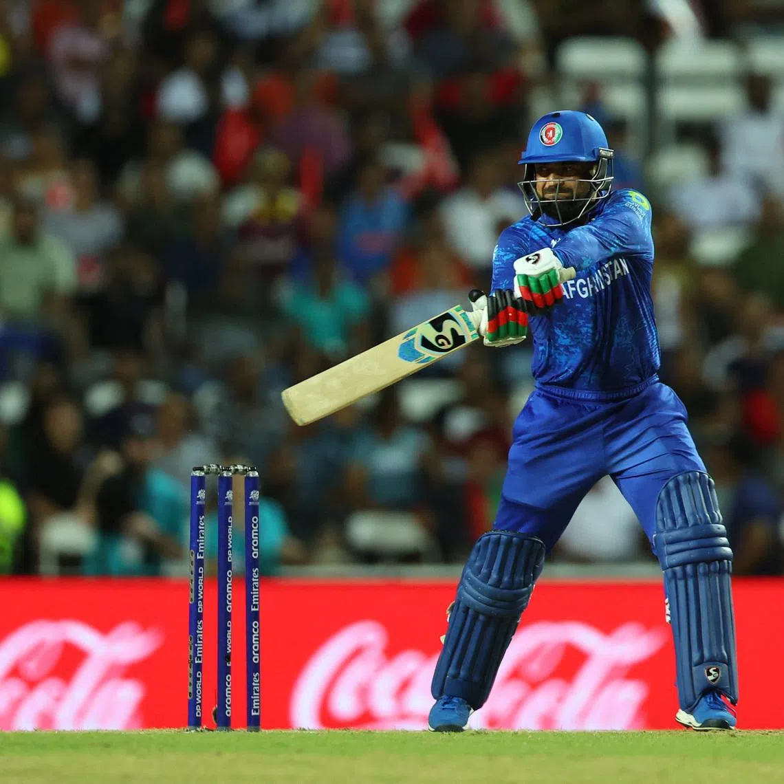 Cricket - T20 World Cup - Semi Final - South Africa v Afghanistan - Brian Lara Stadium, Tarouba, Trinidad and Tobago - June 26, 2024 Afghanistan's Rashid Khan in action REUTERS/Ash Allen