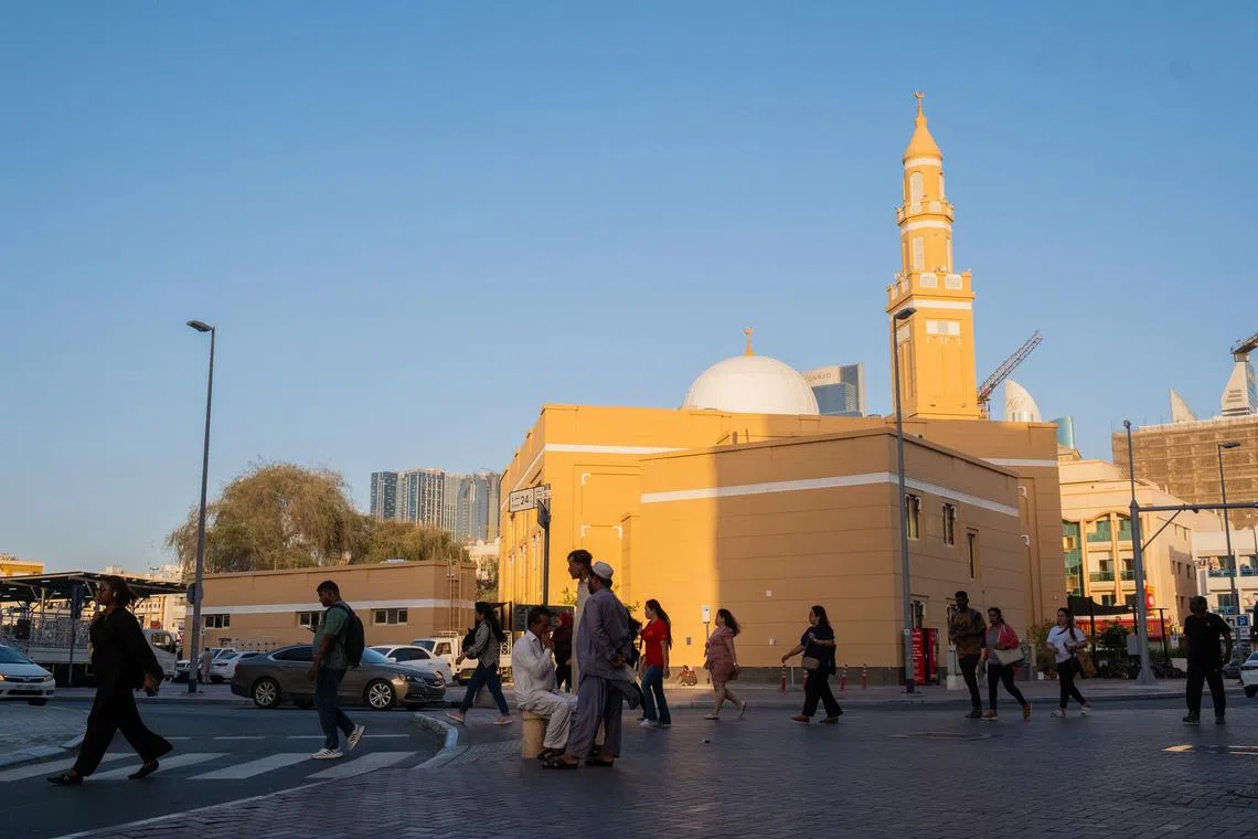 A street in the Satwa neighborhood of Dubai on April 7. Migrant workers in the Arab states would bear the brunt of the Middle East war's impact on the labour market, said a UN agency report.