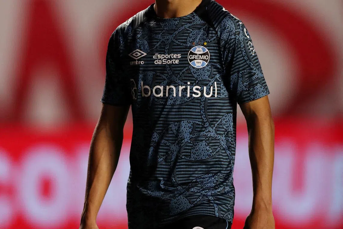 FILE PHOTO: Soccer Football - Brasileiro Championship - Sao Paulo v Gremio - Estadio Morumbi, Sao Paulo, Brazil - July 17, 2024 Gremio's Gustavo Nunes during the warm up REUTERS/Carla Carniel/File Photo