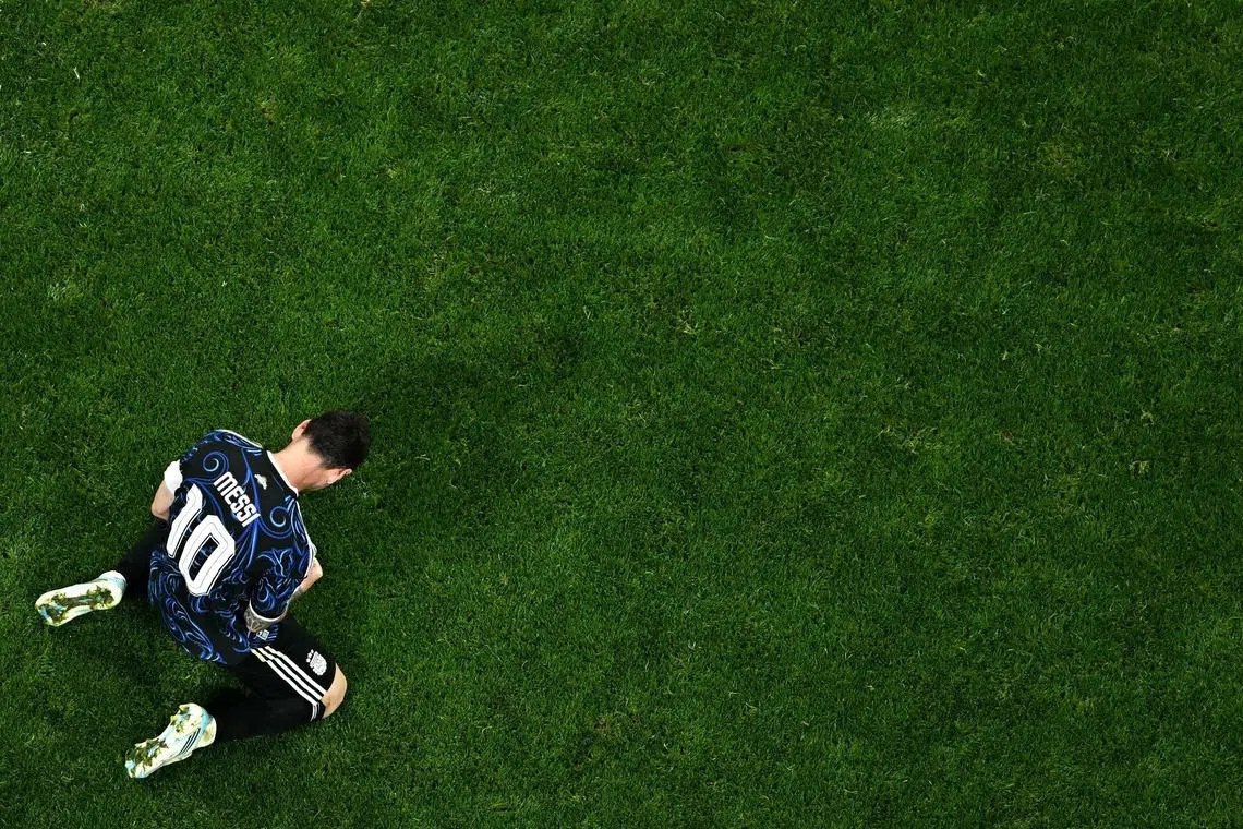 Argentina’s Lionel Messi celebrates after reaching the World Cup final.