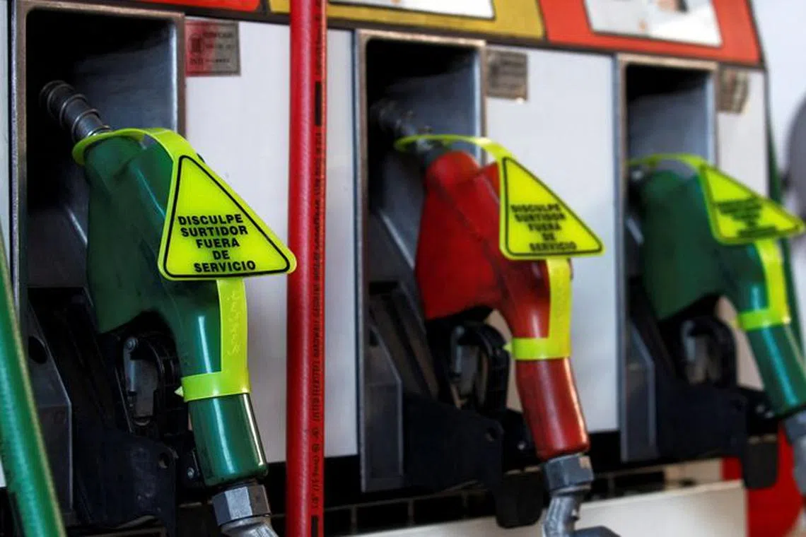 FILE PHOTO: Out-of-service gas pumps are seen at a gas station in Buenos Aires June 21, 2012.  REUTERS/Marcos Brindicci/File Photo