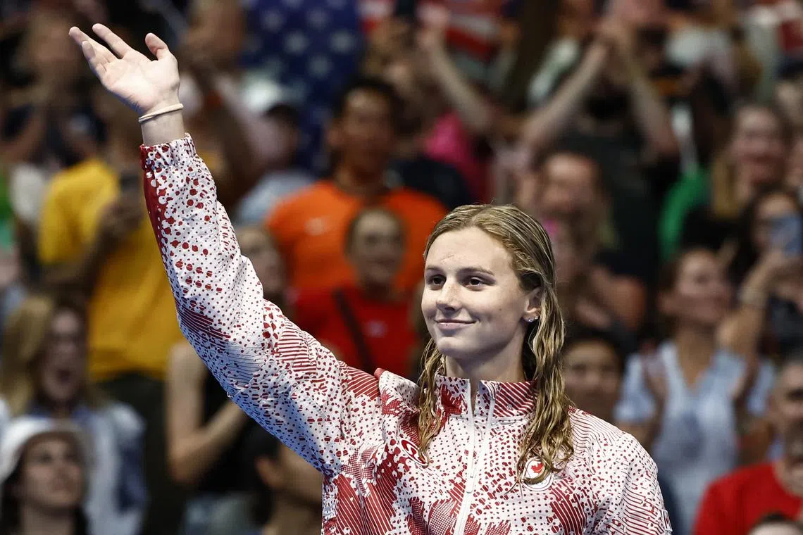 Paris 2024 Olympics - Swimming - Women's 400m Freestyle Victory Ceremony - Paris La Defense Arena, Nanterre, France - July 27, 2024. Silver medallist Summer McIntosh of Canada celebrates on the podium after the race. REUTERS/Clodagh Kilcoyne