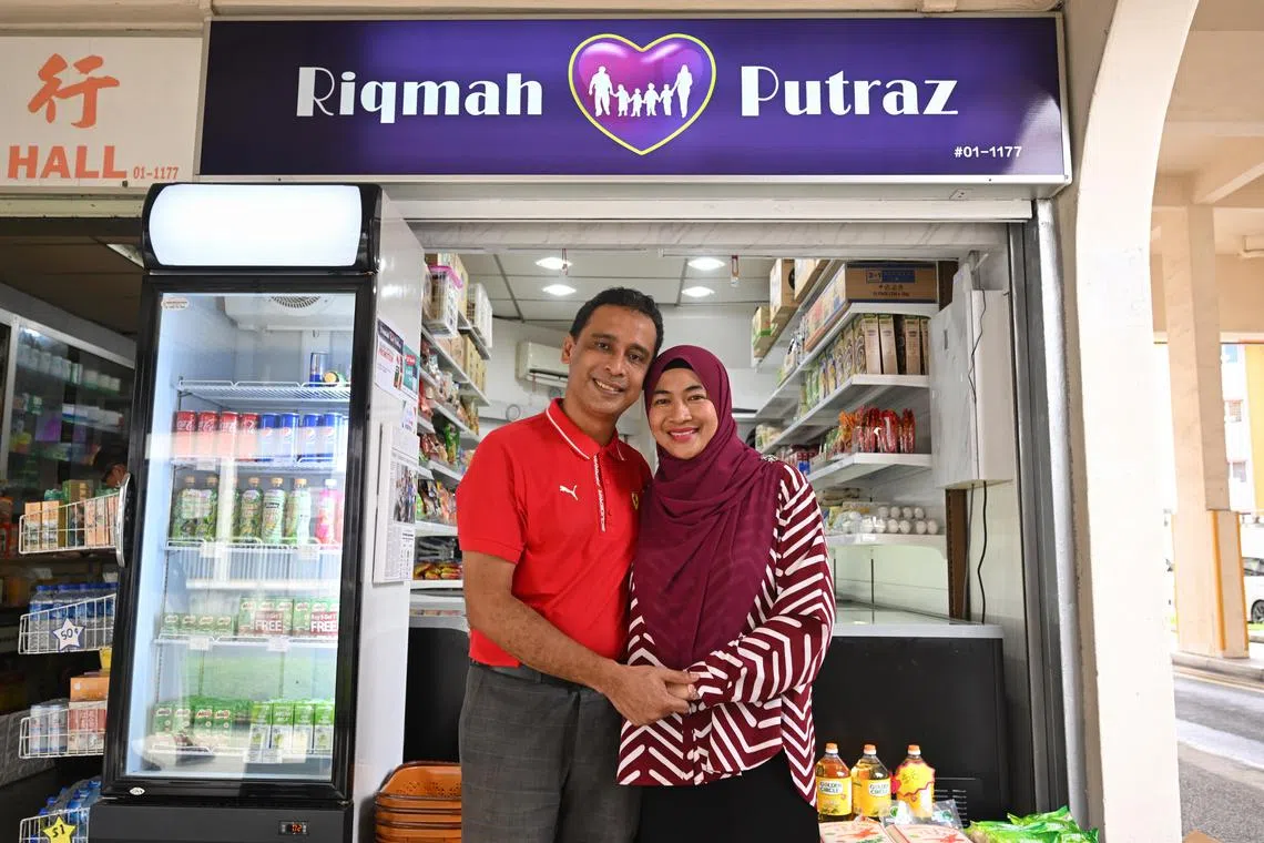 ST20231211_202343214043/fmmart/Shintaro Tay/Fatima Mujibah/
Mr Asanul Fariq Sani and his wife Norhasyimah Awaludin at their minimart in Tampines, on Dec 11, 2023.
The family of six were previously nominated for ST's Singaporean of the Year for distributing free groceries.
Mr Asanul Fariq Sani said the minimart has frozen food and groceries at an affordable price, for those who are less fortunate.