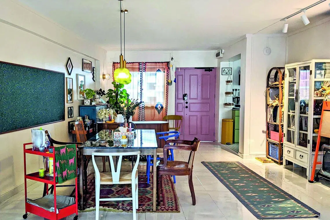 The flat is bright and cheery, as the couple have used bold colours to great effect.